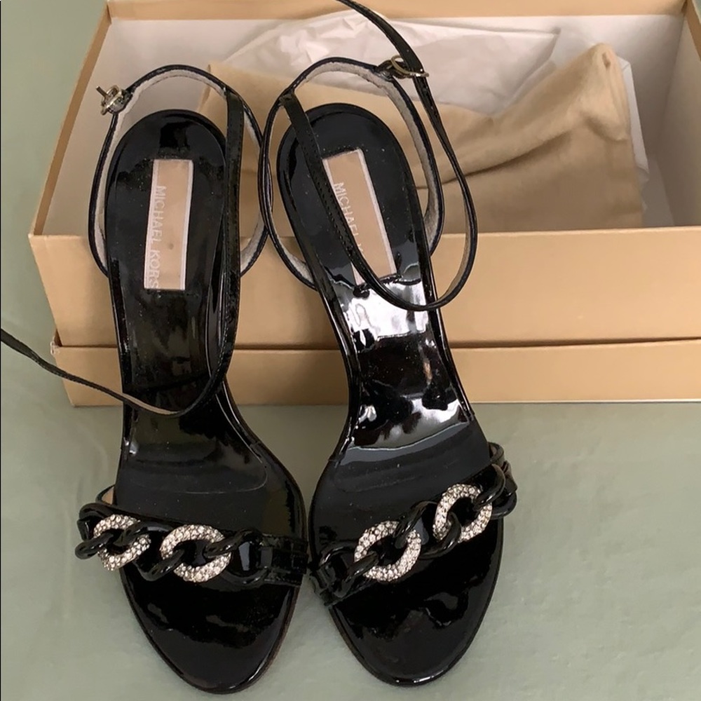 New in box black patent thin Michael Kors heels